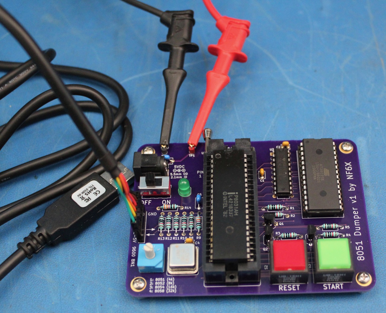 8051dumper board with FTDI TTL-232R-5V cable connected, and power supplied with clip leads